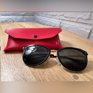 Polarized Carolina Herrera Sunglasses in Black and Gold with Case